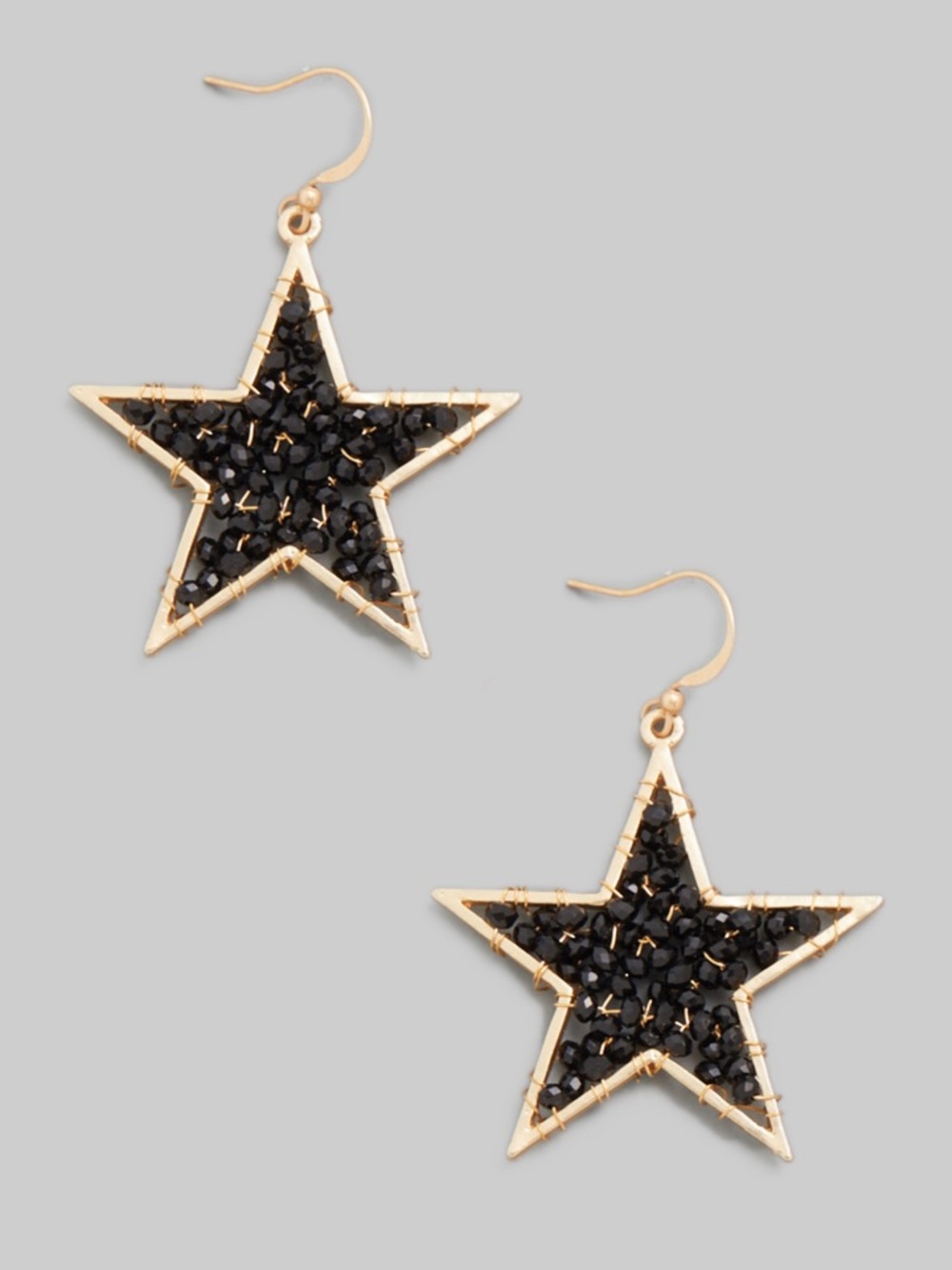 Gold Star Drop Earrings with Black Bead Inlay